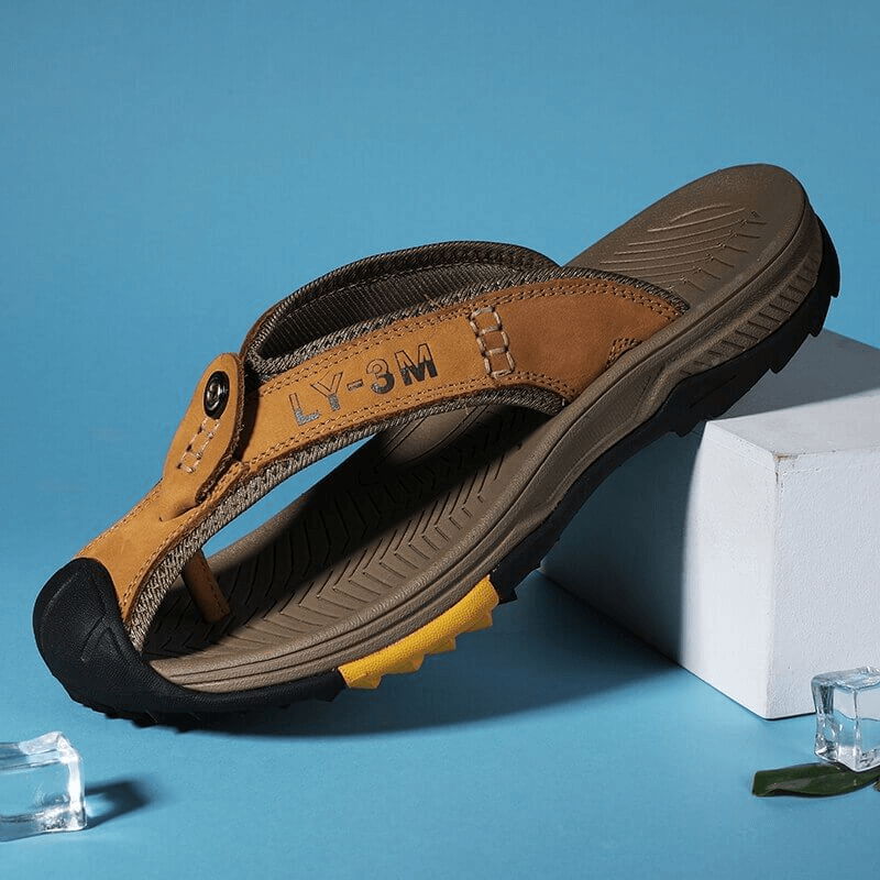 Casual Men's Genuine Leather Anti-slip Flip Flops SF1068 on display with a blue background, highlighting durability and style.